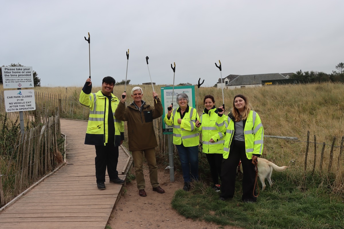 SSEN Distribution team at Lunar Bay, alongside Andy Matthew, Chair of Lunan Bay Communities Partnership