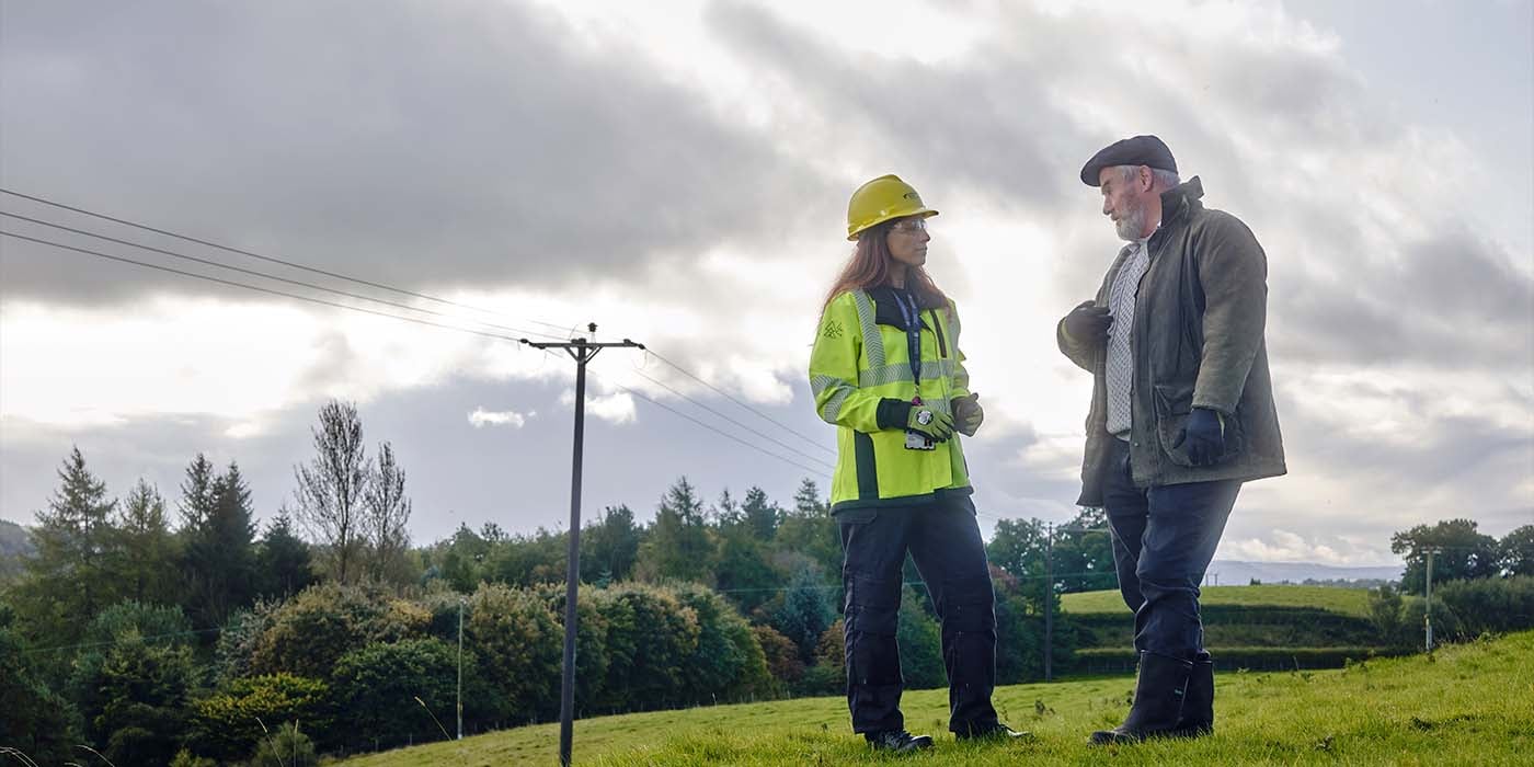 SSEN engineer talking to farmer