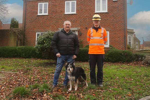 SSEN Engineer with customer and dog