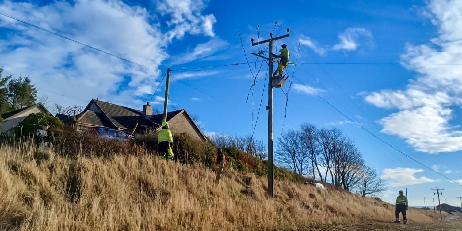 An engineering team fixes a network fault caused by Storm Eowyn