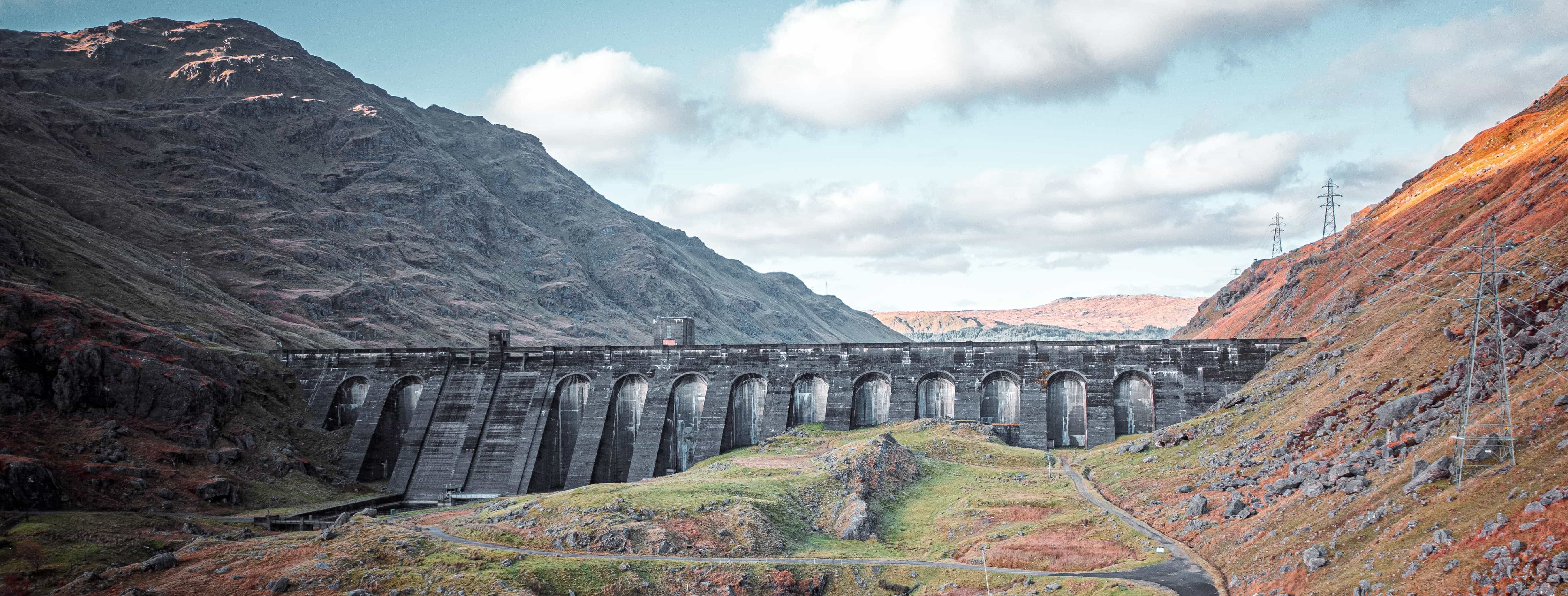 Scenic shot of bridge and scenery in the background.