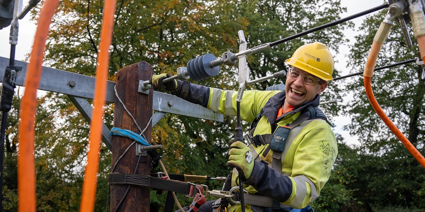 Image of linesperson engineer on our overhead electricity cables